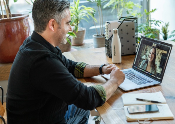 Book a demo - man talking on zoom to a woman